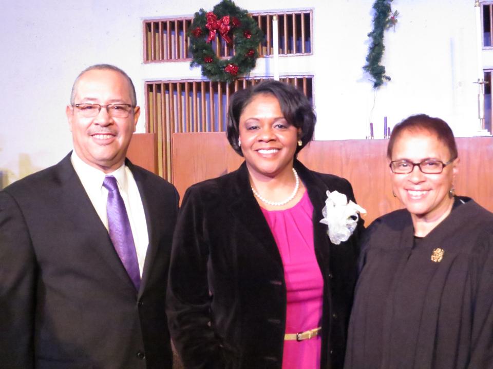 State Rep. Leslie Love is flanked by the Rev. Dr. Nicholas Hood III and the Honorable Denise Page Hood, U.S. federal judge for the Eastern District of Michigan, at a 2015 swearing-in ceremony.