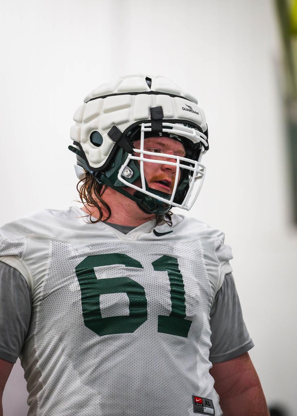 New Michigan State football offensive lineman Tanner Miller (61) mostly played right guard last season at Oregon State but expects to shift to center with the Spartans.