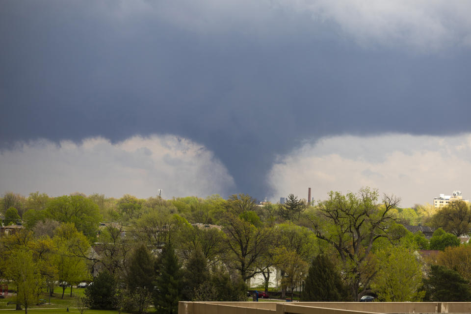 A tornado touches down on Friday, April 26, 2024, in Lincoln, Neb. (Kenneth Ferriera/Lincoln Journal Star via AP)