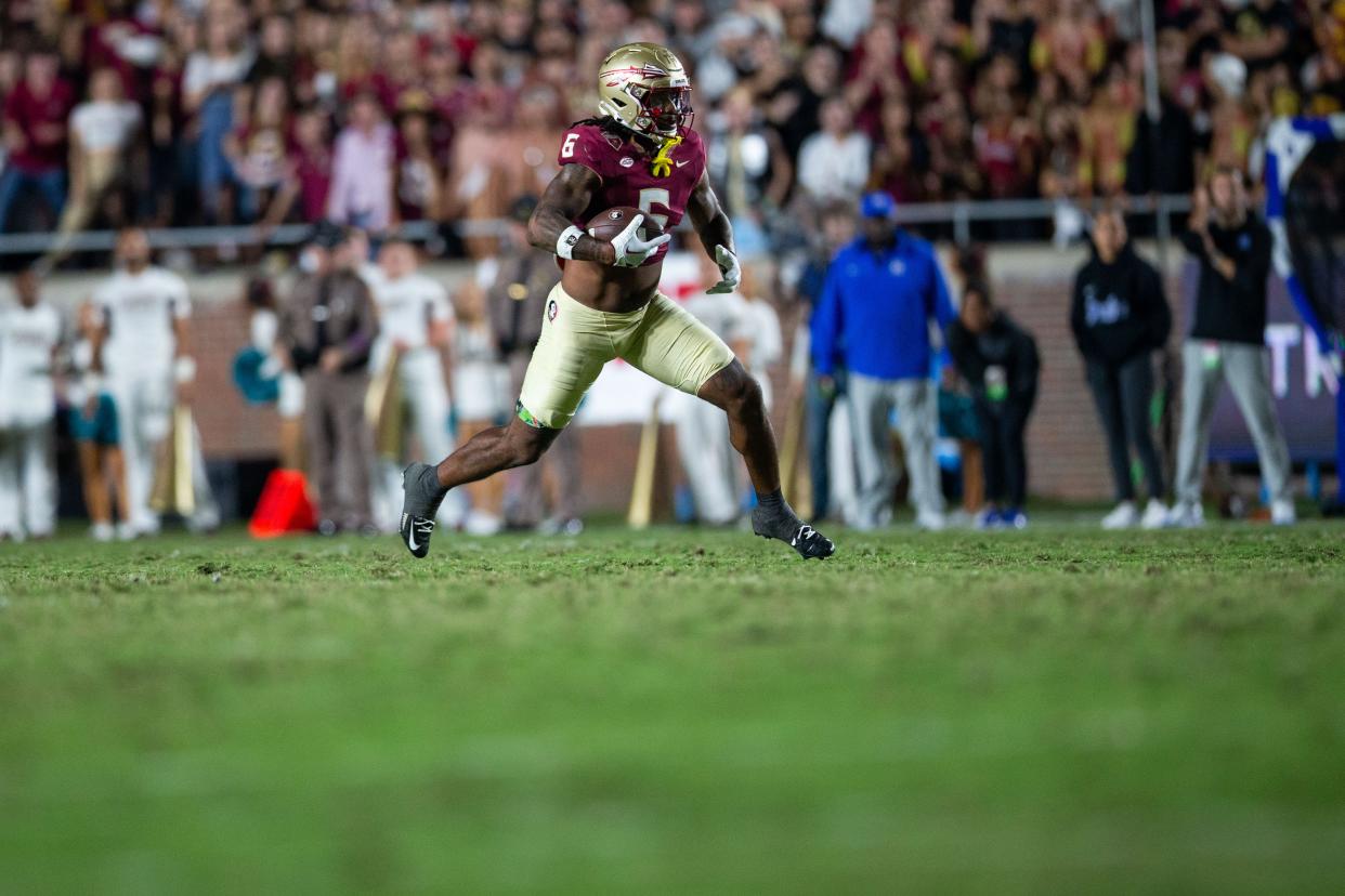 Florida State Seminoles tight end Jaheim Bell (6) makes his way to the end zone for a touchdown. The Florida State Seminoles defeated the Duke Blue Devils 38-20 on Saturday, Oct. 21, 2023.