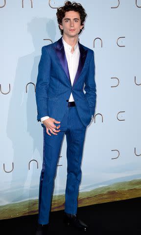 <p>Kristy Sparow/Getty</p> Timothee Chalamet attends the "Dune" photocall At Le Grand Rex on September 06, 2021 in Paris, France.