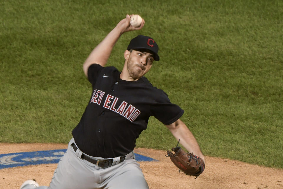 Cleveland Indians starting pitcher Aaron Civale throws to a Chicago Cubs batter during the first inning of a baseball game Wednesday, Sept. 16, 2020, in Chicago. (AP Photo/Mark Black)