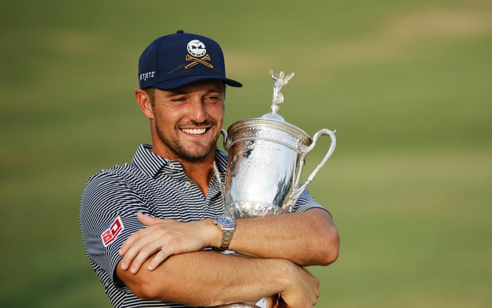 Bryson DeChambeau poses with the trophy after winning the 124th US Open