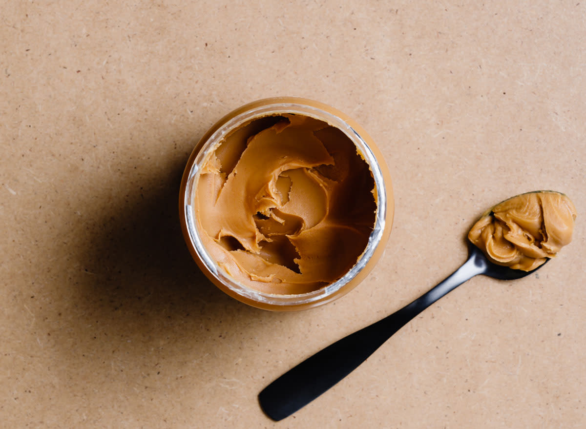 jar of peanut butter with spoon