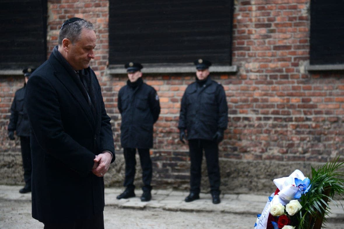 Second Gentleman of the United States Douglas Emhoff lays a wreath at the so-called Death Wall at the site of the Memorial and Museum Auschwitz-Birkenau, on the 78th anniversary of the liberation of the former German Nazi concentration and extermination camp, in Oswiecim, Poland on January 27, 2023, on International Holocaust Remembrance Day. (Photo by BARTOSZ SIEDLIK / AFP) (Photo by BARTOSZ SIEDLIK/AFP via Getty Images)
