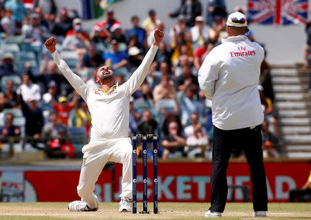 Cricket - Ashes test match - Australia v England - WACA Ground, Perth, Australia, December 18, 2017. Australia's Nathan Lyon celebrates after dismissing England's Moeen Ali during the fifth day of the third Ashes cricket test match. REUTERS/David Gray