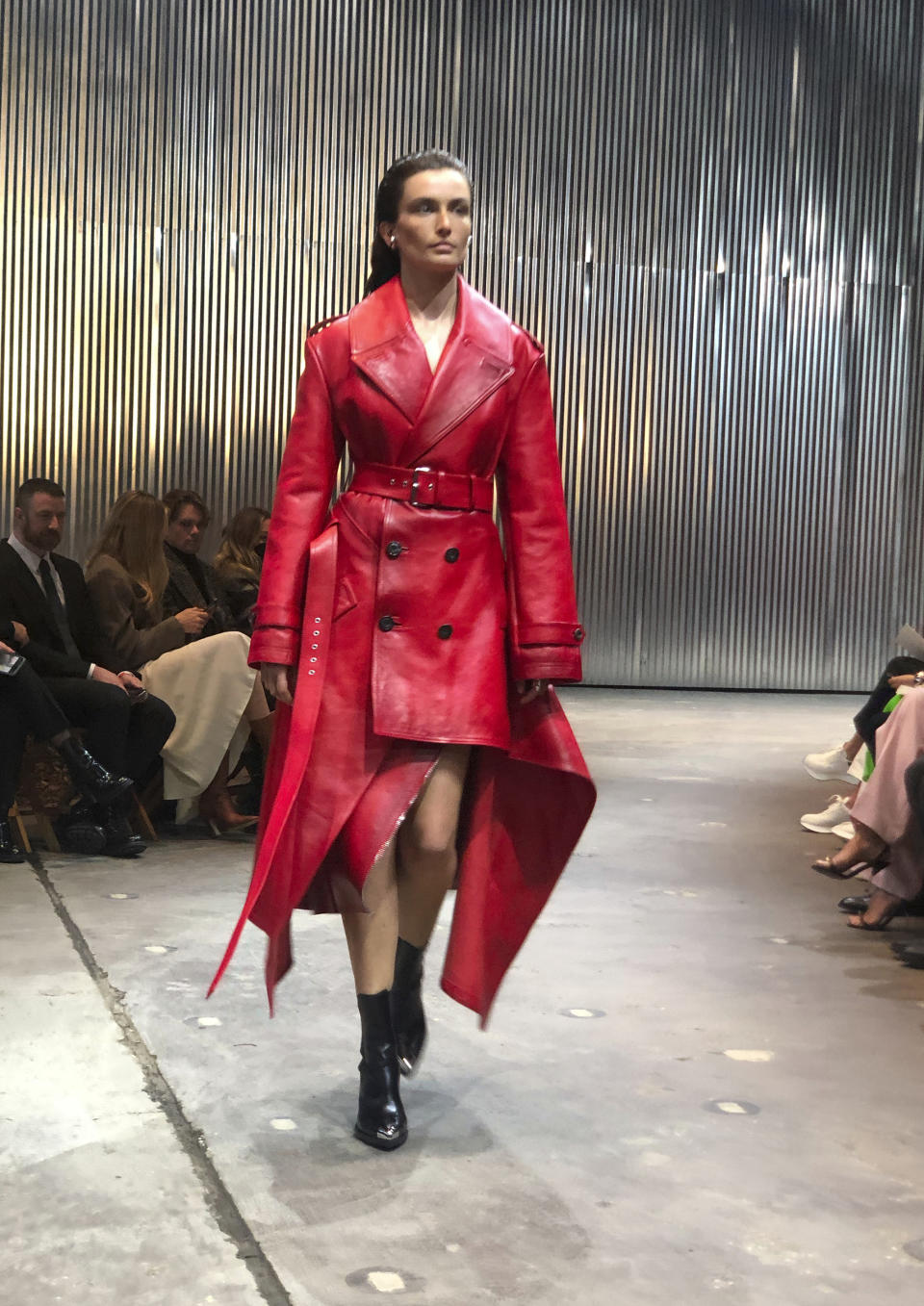 A model walks the runway wearing fashion from the Alexander McQueen Autumn/Winter 2022 collection on Tuesday, March 15, 2022 in New York. (AP Photo/Leanne Italie)