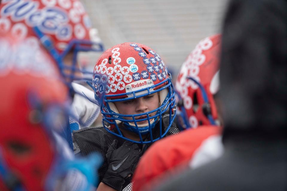 Western Boone lineman Emmy Roys listens during a huddle Tuesday, Oct. 25, 2022, in Thorntown