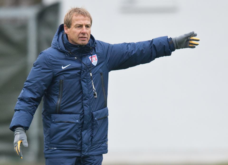 Juergen Klinsmann, coach of the US American national soccer team, leads a training session of his team in Frankfurt Germany, Monday March 3, 2014. The US team will face Ukraine on Cyprus on Wednesday. (AP Photo/dpa,Boris Roessler)