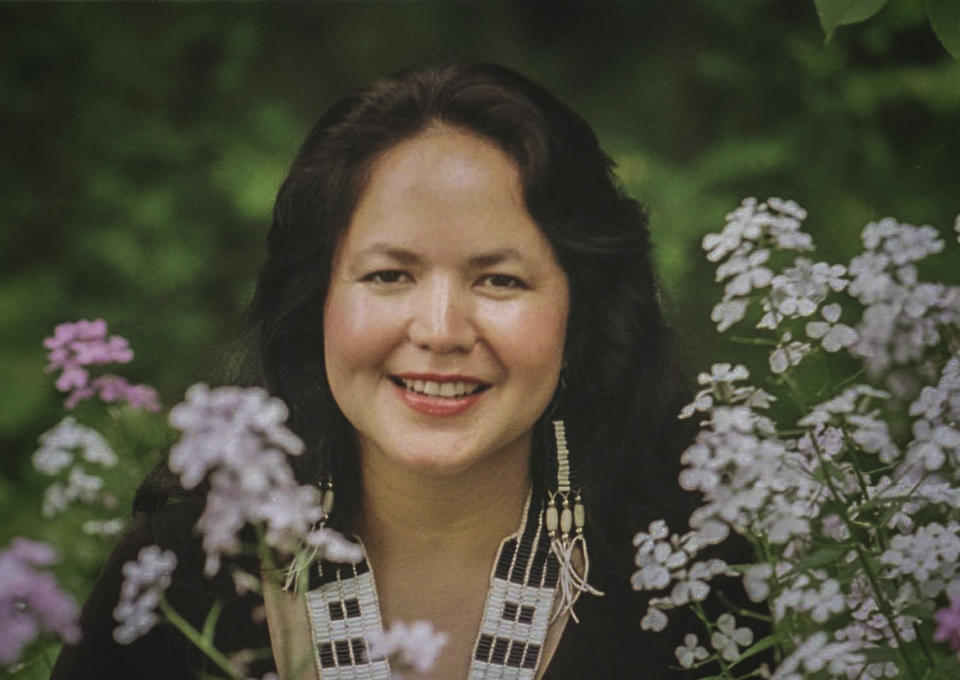 FILE - Native American singer Joanne Shenandoah poses at the ancient Oneida Indian village site known as Nichols Pond near Canastota, N.Y., on June 12, 1996. Shenandoah, the celebrated Native American singer-songwriter who performed before world leaders and on high-profile stages, has died. The Native American Music Awards & Association posted on its website that Shenandoah, described as “Native America's musical matriarch," died Monday night, Nov. 22, 2021, in Scottsdale, Ariz., after complications of abdominal bleeding. She was 63. (AP Photo/Michael Okoniewski, File)