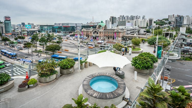 An overhead shot of an elevated park in a city centre.