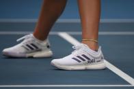 Gauff und Partnerin Catherine McNally hatten nicht nur ihre Schuhe bemalt, sondern gaben nach ihrem Sieg auch eine Bryant-Choreographie zum Besten. (Bild: Getty Images)