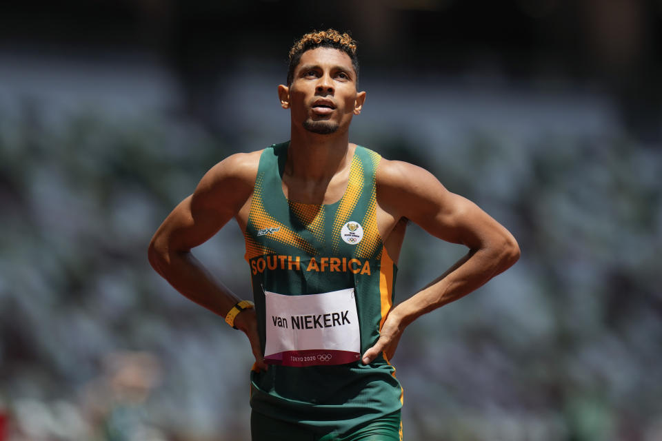 Wayde Van Niekerk, of South Africa, runs in a heat in the men's 400-meter run at the 2020 Summer Olympics, Sunday, Aug. 1, 2021, in Tokyo. (AP Photo/Petr David Josek)