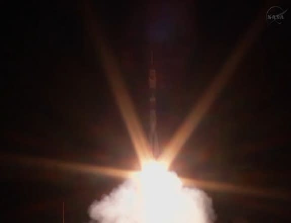 A Russian Soyuz rocket blasts two cosmonauts and one NASA astronaut toward the International Space Station from Baikonur Cosmodrome in Kazakhstan on Sept. 25, 2013.