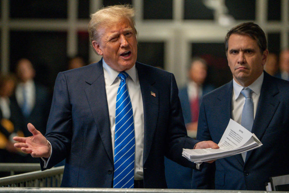 Former US President Donald Trump speaks to the press at the end of Monday’s trial proceedings. 