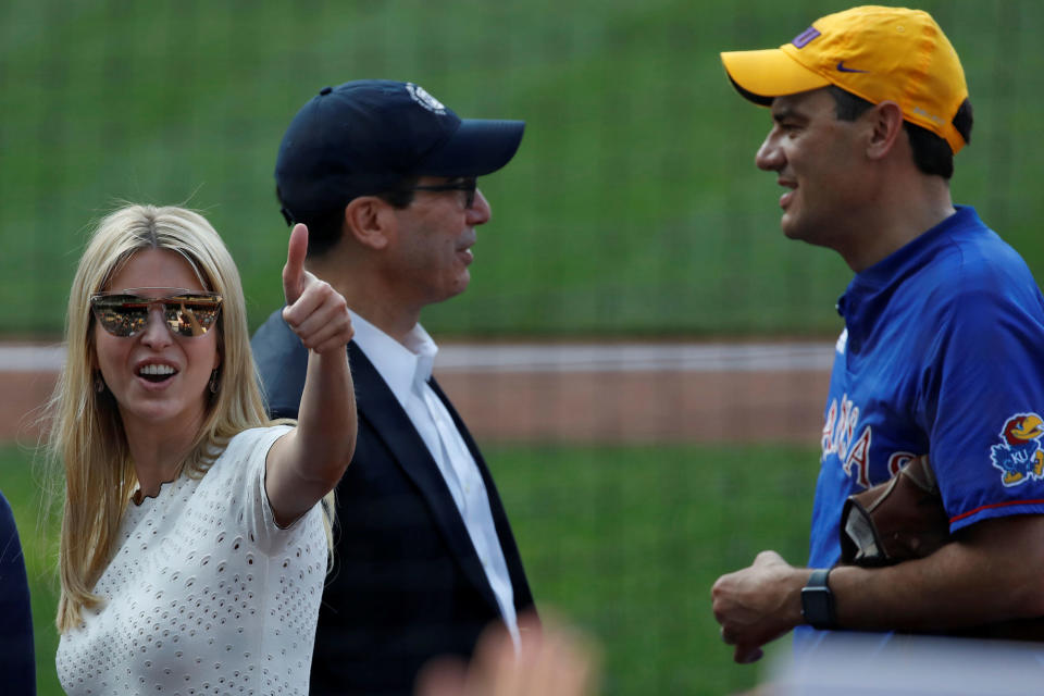 <p>Ivanka Trump, Assistant to President Donald Trump, gestures to the crowd next to Treasury Secretary Steven Mnuchin prior to the Congressional Baseball Game at Nationals Park in Washington, June 15, 2017. (Photo: Joshua Roberts/Reuters) </p>