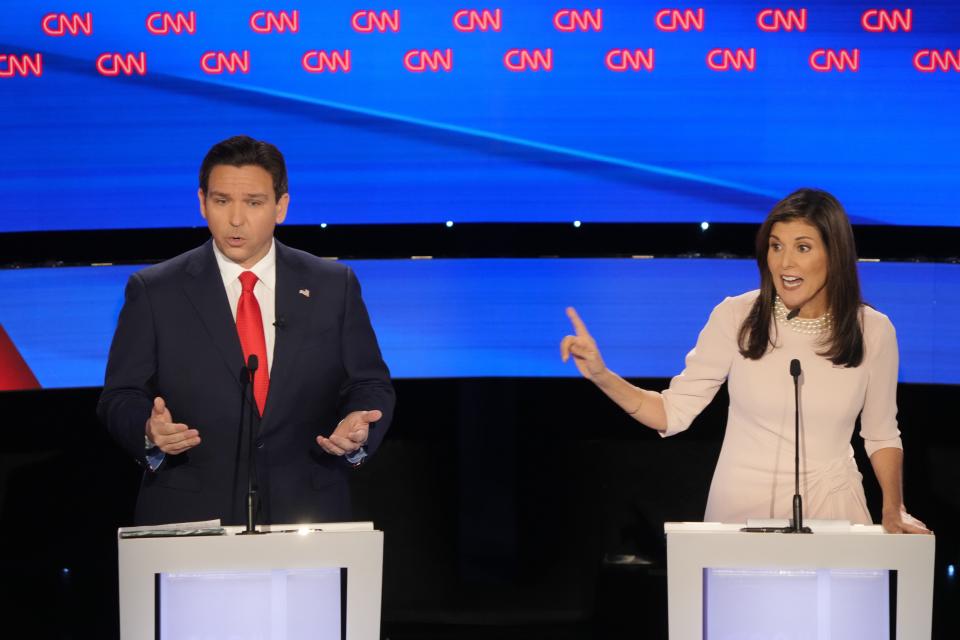 Florida Gov. Ron DeSantis and former South Carolina Gov. Nikki Haley exchange words at the Republican Presidential Primary Debate at Drake University in Des Moines, Iowa on Jan. 10, 2024.