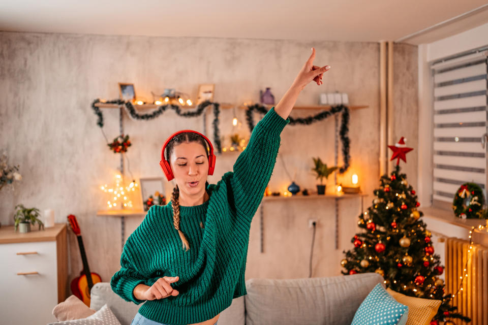 GettyImages 1354867699 Zodiac Signs as Christmas Music—Which Song Captures Your Holiday Spirit?