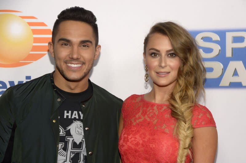 Alexa PenaVega (R) experienced a pregnancy loss while expecting her fourth child with Carlos PenaVega. File Photo by Phil McCarten/UPI