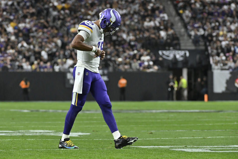 Minnesota Vikings quarterback Joshua Dobbs walks off the field during the first half of an NFL football game against the Las Vegas Raiders, Sunday, Dec. 10, 2023, in Las Vegas. (AP Photo/David Becker)