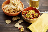 This image shows a recipe for tropical fruit salsa. AP food writer Katie Workman says it's extremely simple to make your own salsa for Super Bowl celebrations. All you need is a willingness to chop, mince and dice. (Cheyenne Cohen via AP)