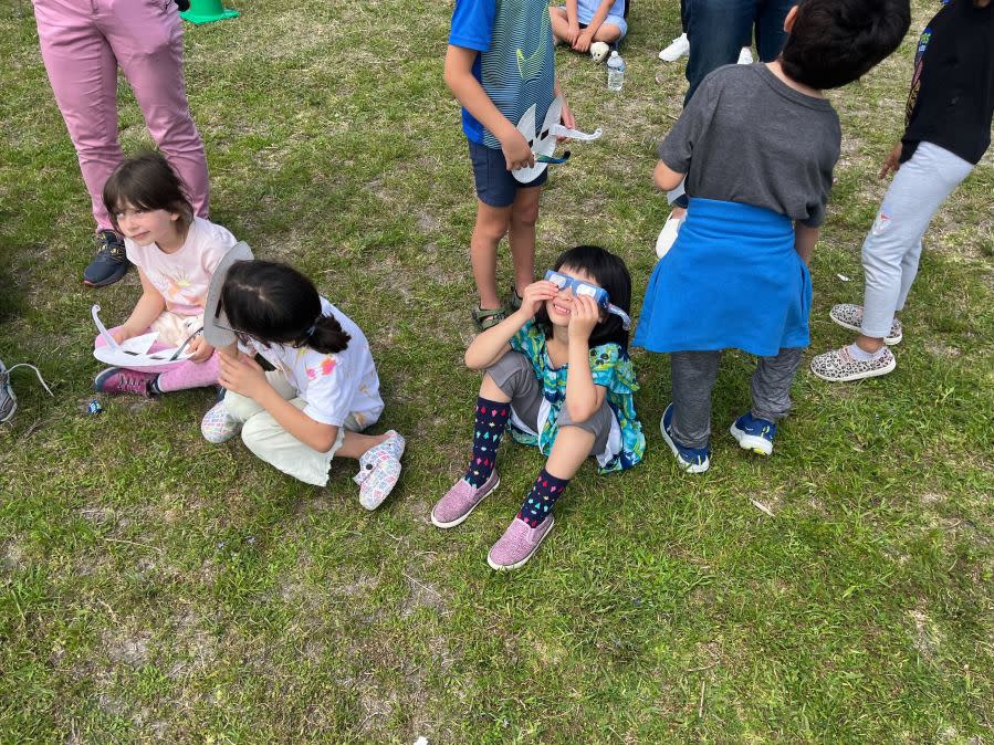 Kids at Reilly Elementary School in Austin, Texas, watch the total solar eclipse. (KXAN Photo/Kelly Wiley)