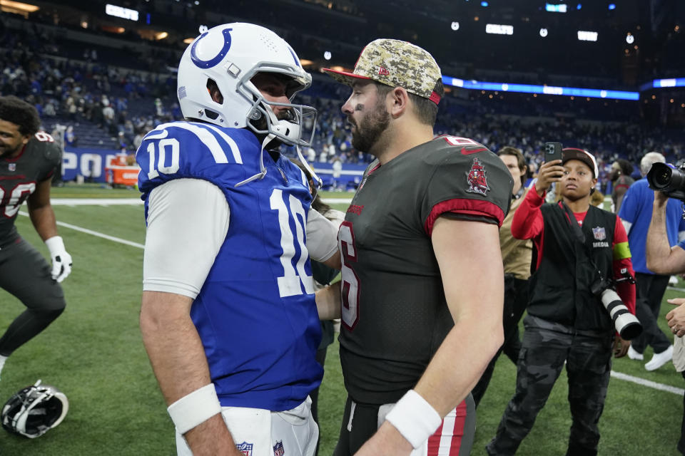 Indianapolis Colts quarterback Gardner Minshew (10) greets Tampa Bay Buccaneers quarterback Baker Mayfield (6) after an NFL football game Sunday, Nov. 26, 2023, in Indianapolis. (AP Photo/Michael Conroy)