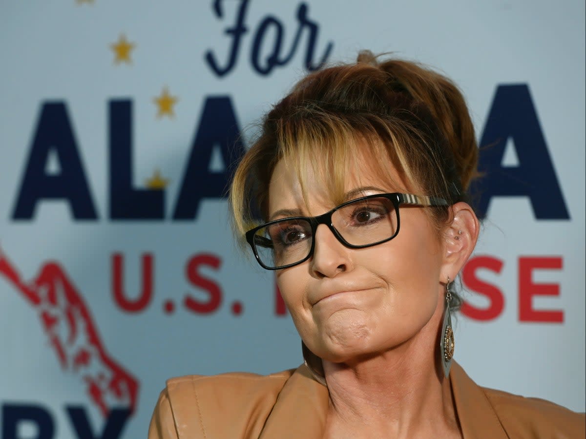 U.S. House candidate Sarah Palin speaks to the media at her campaign headquarters in South Anchorage, Alaska, after the rank choice ballots were counted on Wednesday, Aug. 31, 2022 (AP)