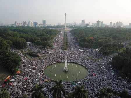 Tens of thousands of Indonesian Muslims attend a rally to commemorate a series of rallies starting in late 2016 in Jakarta, Indonesia December 2, 2018 in this photo taken by Antara Foto. Antara Foto/Sigid Kurniawan/ via REUTERS
