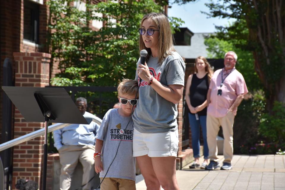 Sarah Neumann, with son Noah, who is a Covenant School student on the Franklin Public Square on Friday, June 2. Neumann spoke at the Gun Violence Awareness Day rally for gun law reform.