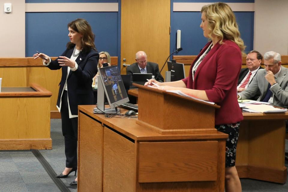 Fulton County special prosecutor Anna Cross, left, who represents Fani Willis, appears alongside defence attorney Ashleigh Merchant, right, during a hearing on 16 February (AP)