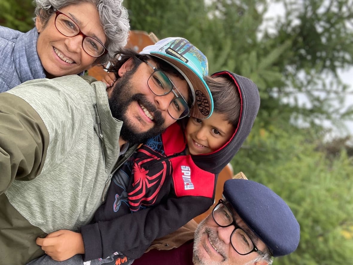 Sebastian Ibarra, centre, is shown with his mother and five-year-son, Xavi, during his parents' last visit to British Columbia in October. His parents and brother, who are supposed to visit him from Mexico this summer, will be affected by Ottawa's new visa rules. (Submitted by Sebastian Ibarra - image credit)
