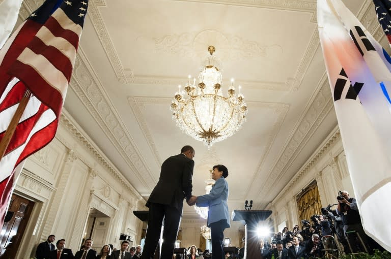 South Korean President Park Geun-hye (R) attends a press conference with US President Barack Obama in the East Room of the White House on October 16, 2015 in Washington, DC