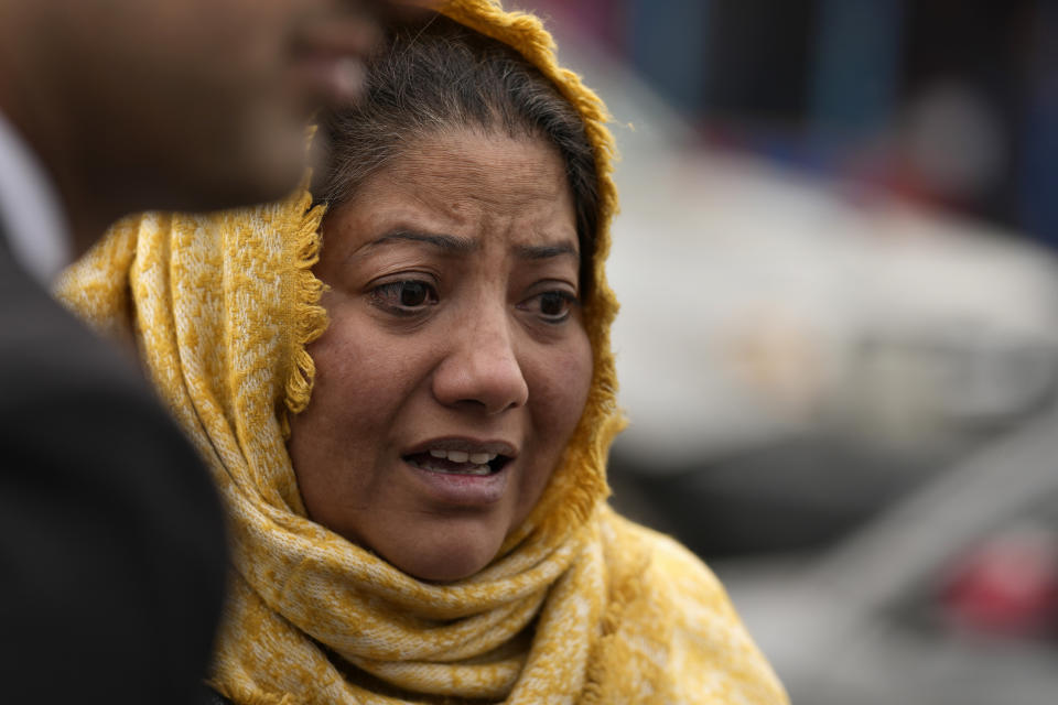 A supporter of Pakistan's former Prime Minister Imran Khan weeps as she reacts following a special court decision, outside the Adiyala prison, in Rawalpindi, Pakistan, Tuesday, Jan. 30, 2024. A Pakistani court on Tuesday sentenced former Prime Minister Khan and one of his party deputy Qureshi to 10 years in prison each, after finding them guilty of revealing official secrets. (AP Photo/Anjum Naveed)