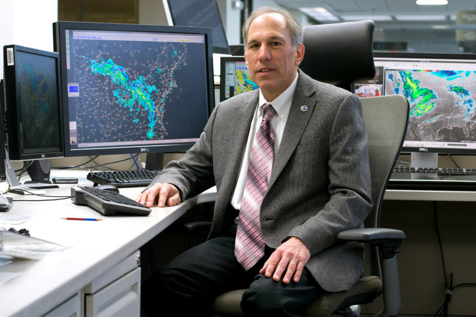 In this undated photo provided by NOAA, William Lapenta poses at the Weather Prediction Center, in College Park, Md. Lapenta, a federal scientist who oversaw weather prediction centers that track ocean, hurricane and even space conditions died Monday, Sept. 30, 2019, after lifeguards pulled him from the surf in rough seas on North Carolina’s Outer Banks. (NOAA via AP)