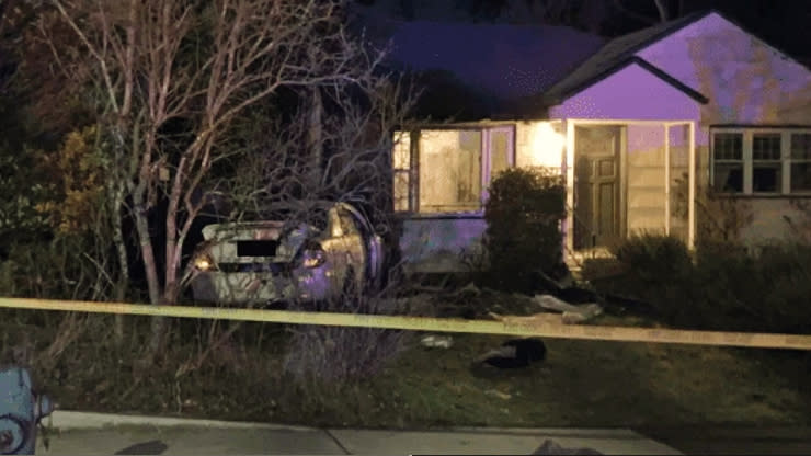 A kidnapping victim escaped from the trunk of his own car after police said the suspects crashed into a home in Seattle's Ravenna neighborhood on March 16, 2023. (KING)