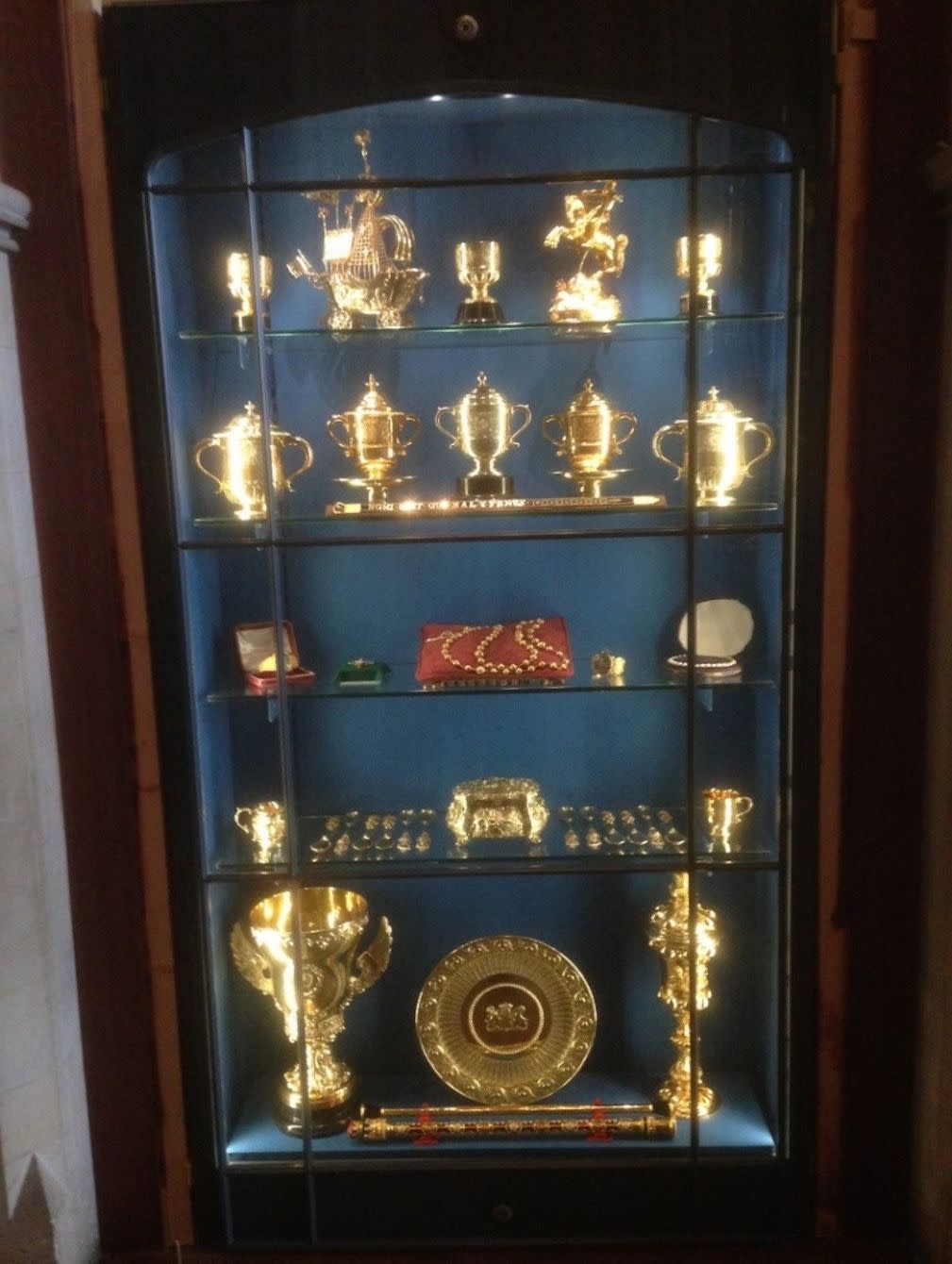 The display cabinet showing the stolen treasures although police say that not all items shown were taken (Sussex Police/PA)