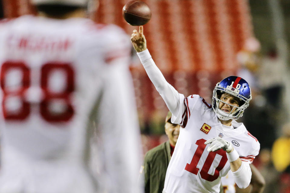 New York Giants quarterback Eli Manning has been benched by coach Ben McAdoo. (AP)