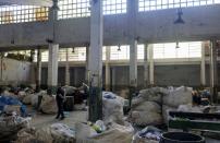 Luiz Carlos Fernandes, president of Coopama, a waste recycling cooperative, walks at their warehouse after they stopped working during the coronavirus disease (COVID-19) outbreak, in Rio de Janeiro