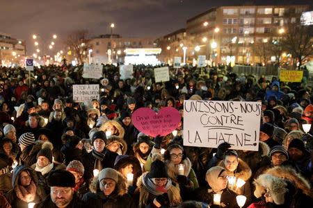 People attend a vigil in support of the Muslim community in Montreal, Quebec, January 30, 2017. REUTERS/Dario Ayala