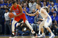 Florida's Kerry Blackshear Jr. (24) looks for an opening on Kentucky's Nick Richards in the first half of an NCAA college basketball game in Lexington, Ky., Saturday, Feb. 22, 2020. (AP Photo/James Crisp)