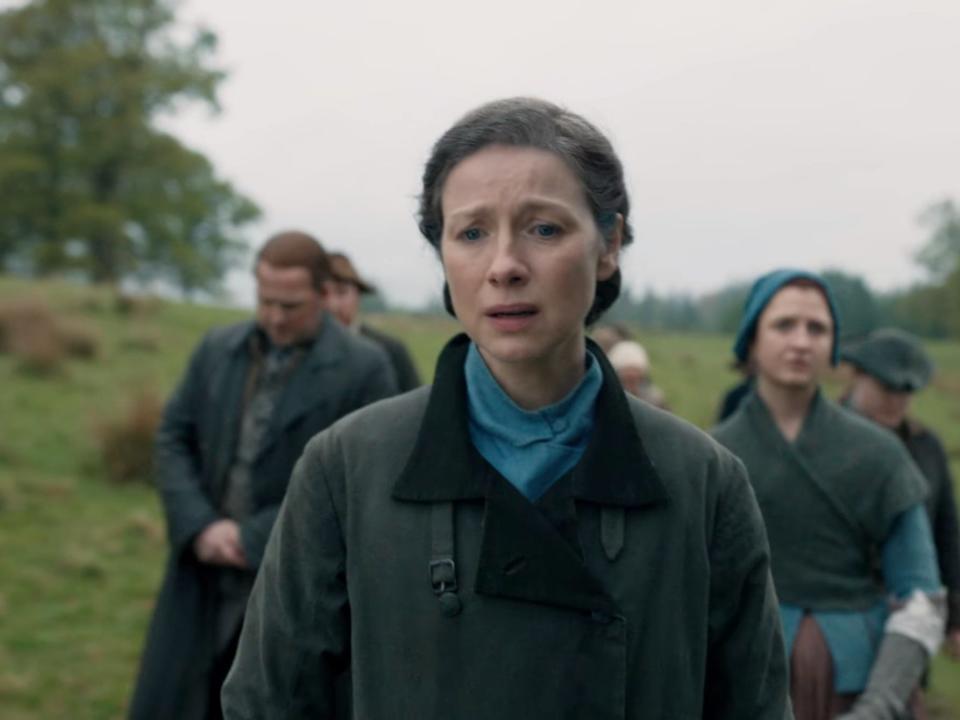 Claire (Caitríona Balfe) introduces her 18th century companions to another song that has yet to be written.