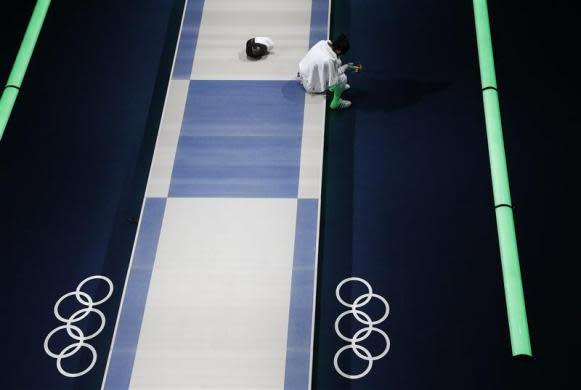 South Korea's Shin A Lam reacts after being defeated by Germany's Britta Heidemann (not seen) during their women's epee individual semifinal fencing competition at the ExCel venue at the London 2012 Olympic Games July 30, 2012.