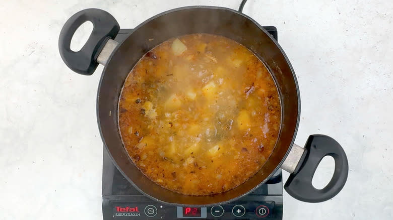 soup simmering in pan