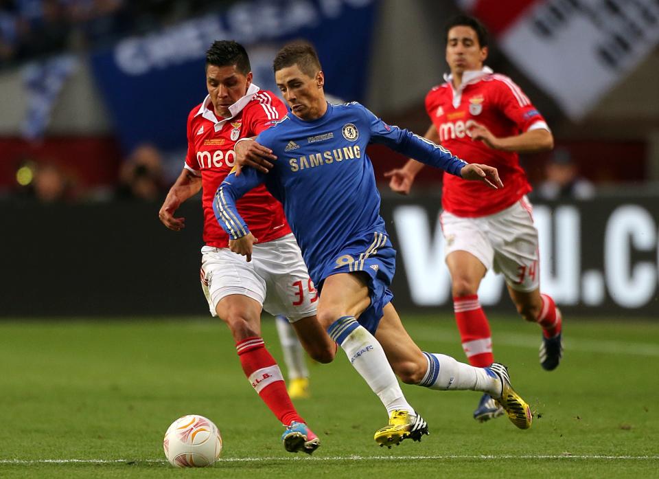 Benfica's Enzo Perez (left) and Chelsea's Fernando Torres battle for the ball