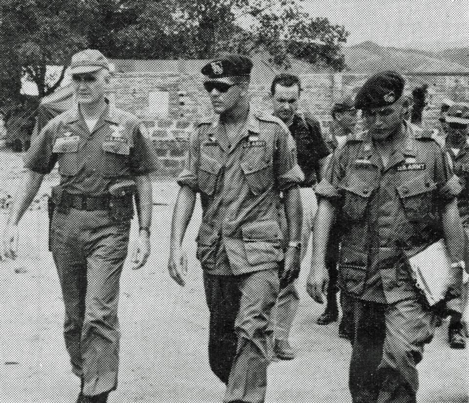 Then-Capt. Paris D. Davis, center, with Gen. William Westmoreland, left, commander of U.S. Forces in Vietnam, and Billy J. Cole.