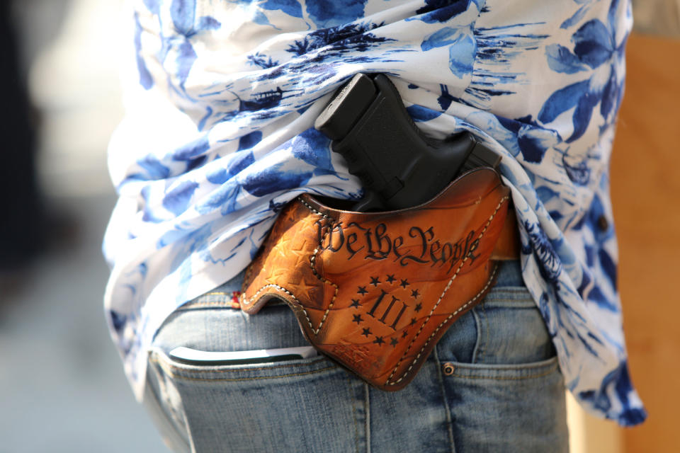 Detail of a holstered firearm of Matt Marshall, leader of the Washington 3%