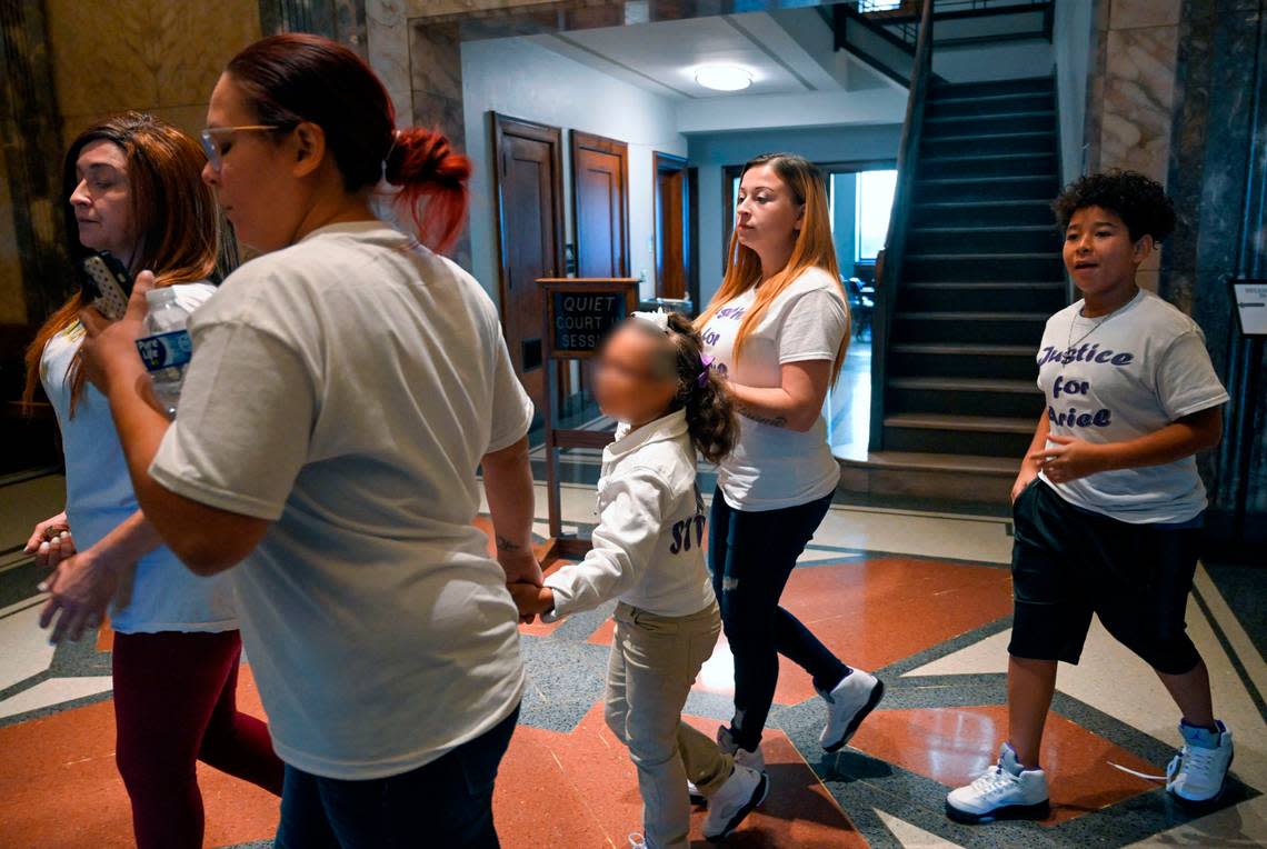 The family of Ariel Young leave the Jackson County Courthouse after Britt Reid was sentenced to three years in prison for driving while intoxicated and causing a 2021 crash that severely injured a 5-year-old Ariel.