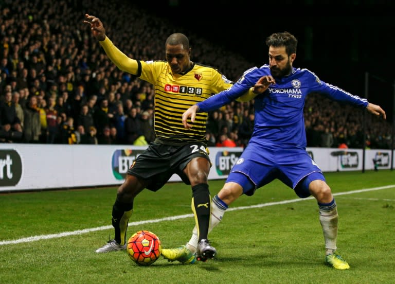 Chelsea's Cesc Fabregas (R) tackles Watford's Odion Ighalo (L) during the English Premier League football match in Watford, north of London on February 3, 2016