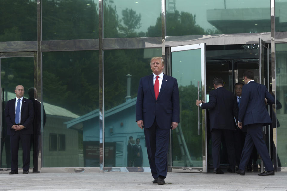 President Donald Trump walks out of Freedom House on his way to meet with North Korean leader Kim Jong Un at the border village of Panmunjom in Korea on June 30, 2019. 